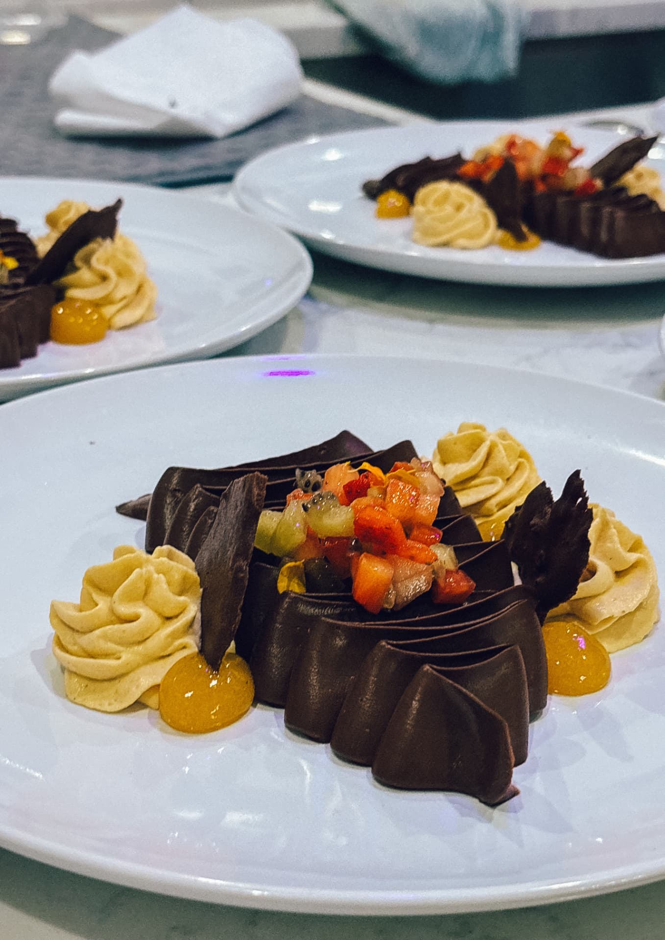 Chocolate dessert plated at a Luma Society dinner