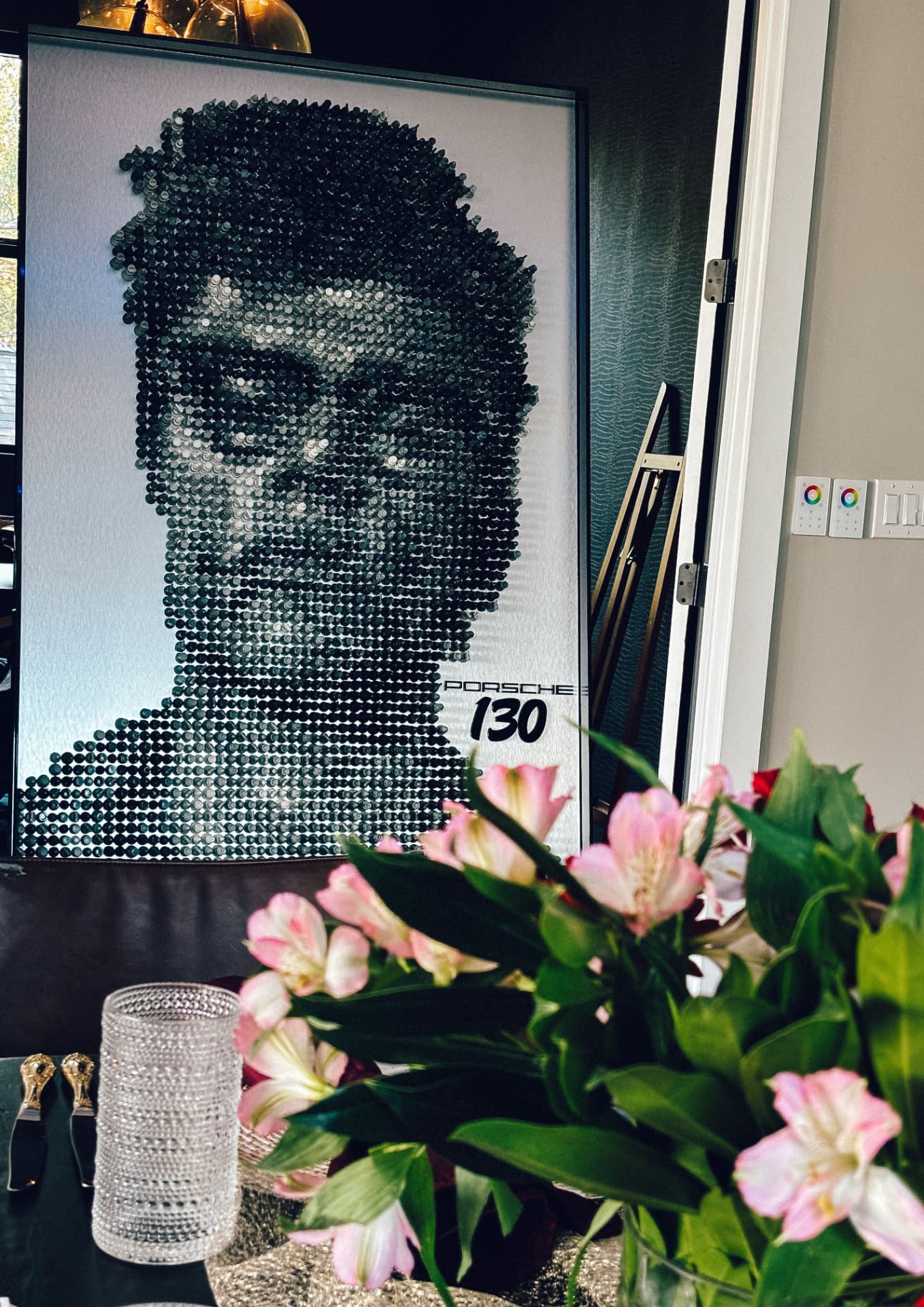 A portrait artwork above the dinner table at a Luma Society evening